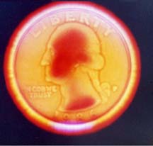 Kirlian photograph of a coin – C41 film